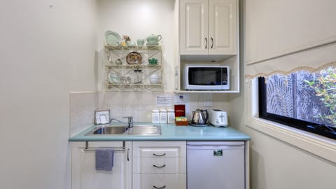 Garden View | Private kitchenette | Full-size fridge, microwave, stovetop, cookware/dishes/utensils