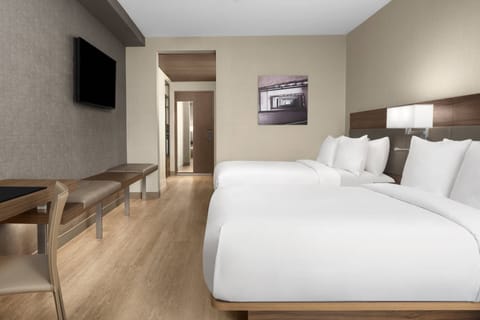 Hypo-allergenic bedding, in-room safe, desk, laptop workspace