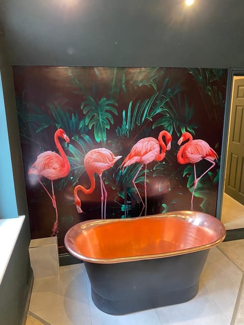 Flamingo | Bathroom | Designer toiletries, hair dryer, towels, soap