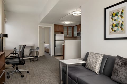 Suite, 2 Bedrooms | Living room | TV