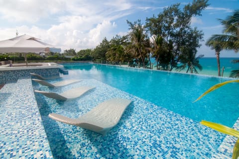 2 outdoor pools, pool umbrellas, sun loungers