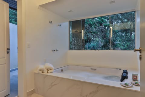 Suite (Specialle) | Bathroom | Designer toiletries, hair dryer, bathrobes, slippers