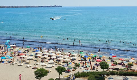 Beach nearby, sun loungers, beach umbrellas