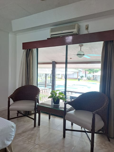 Veranda Room | Minibar, in-room safe, individually furnished, desk