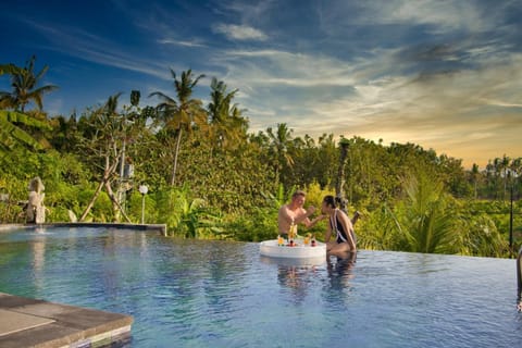 Outdoor pool, pool umbrellas, sun loungers