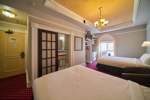 Deluxe Double Room, 2 Queen Beds, Courtyard View | Premium bedding, blackout drapes, iron/ironing board, free WiFi