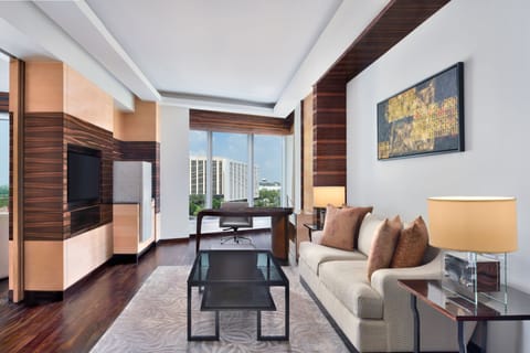 Club Suite, 1 Bedroom, Non Smoking | Living room | 32-inch TV with digital channels, DVD player, iPod dock