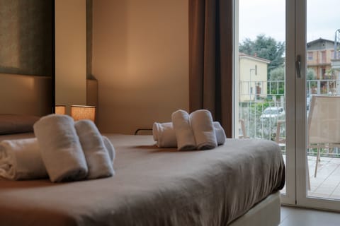 Double Room, Balcony | Minibar, in-room safe, desk, laptop workspace