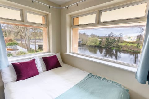 Family Room, River View | Individually decorated, individually furnished, WiFi, bed sheets