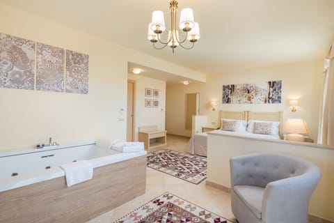 Suite, 1 King Bed, Hot Tub, City View | In-room safe, free WiFi, bed sheets