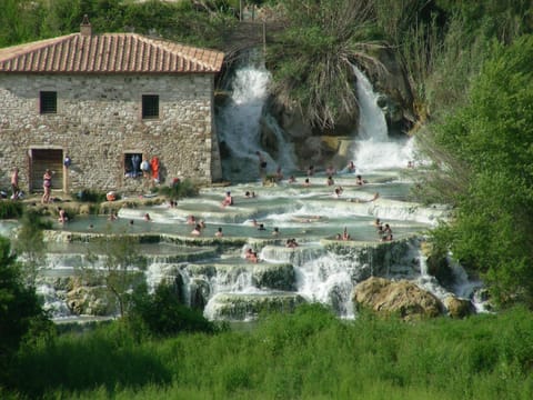 A natural pool, sun loungers