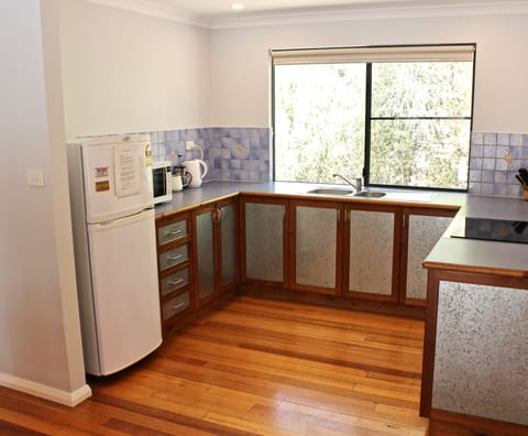 Brook Cottage | Private kitchen | Full-size fridge, microwave, oven, stovetop