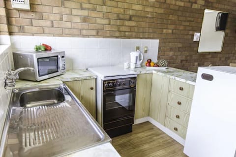 Family Room | Private kitchen | Fridge, electric kettle