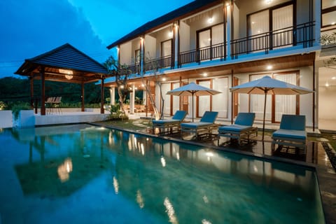 2 outdoor pools, pool umbrellas, sun loungers