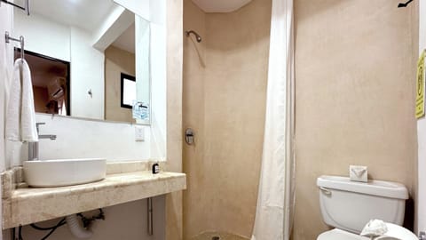 Superior Room, 1 Queen Bed | Bathroom | Shower, free toiletries, towels, soap