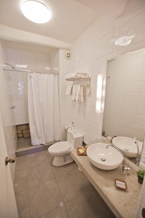 Rainfall showerhead, free toiletries, hair dryer, towels