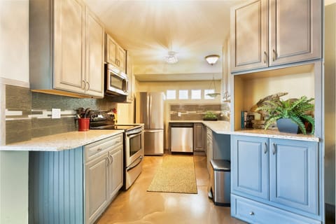 Suite, 1 Bedroom | Private kitchen | Full-size fridge, microwave, stovetop, dishwasher