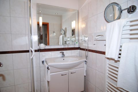 Double Room, Lake View | Bathroom amenities | Shower, hair dryer, bathrobes, slippers