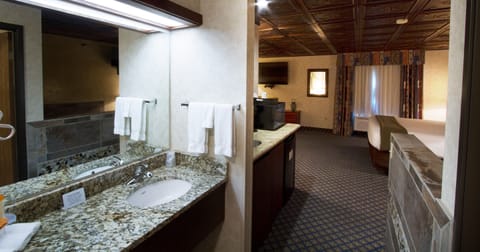 Presidential Studio Suite, Hot Tub | Bathroom sink