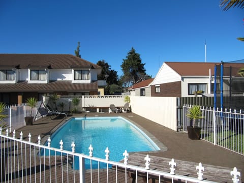 Outdoor pool, pool umbrellas, sun loungers