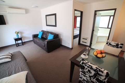 Apartment, 1 Bedroom | Desk, iron/ironing board, free WiFi, bed sheets