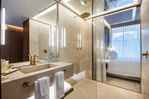 Superior Double Room | Bathroom | Separate tub and shower, rainfall showerhead, hair dryer, bathrobes