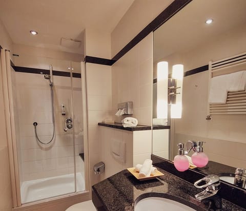 Deluxe Double Room, Balcony, City View | Bathroom | Shower, hair dryer, soap, shampoo