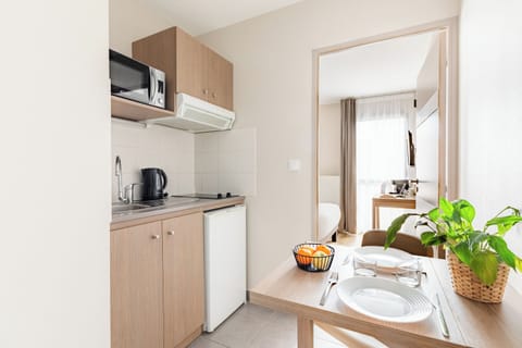 Studio | Private kitchen | Fridge, microwave, electric kettle, highchair