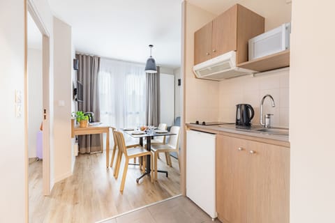 Apartment | Private kitchen | Fridge, microwave, electric kettle, highchair