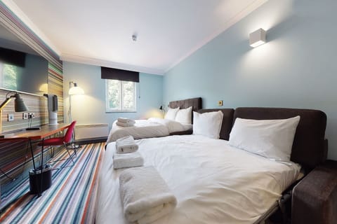 Family Room (1 Double & 2 Rollaway Beds) | Desk, laptop workspace, blackout drapes, iron/ironing board