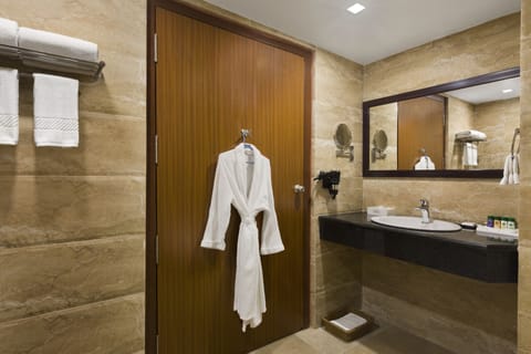 Eco-friendly toiletries, hair dryer, bathrobes, slippers