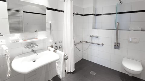 Single Room | Bathroom | Shower, hair dryer, slippers, heated floors