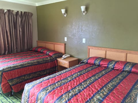 Standard Room, 2 Queen Beds, Non Smoking | Free WiFi