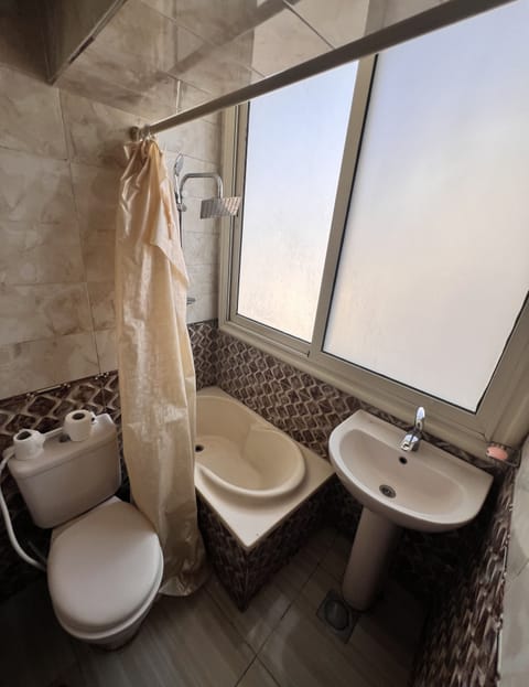 4 Beds Room | Bathroom | Separate tub and shower, slippers, towels