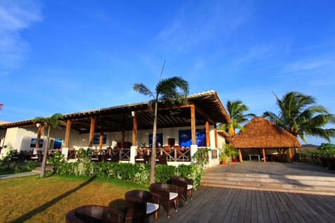 Lunch, dinner served; international cuisine, beach views 