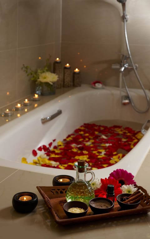 Couples treatment rooms, spa tub, aromatherapy, deep-tissue massages