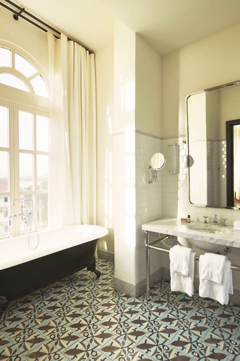 Suite | Bathroom | Rainfall showerhead, designer toiletries, hair dryer, bathrobes