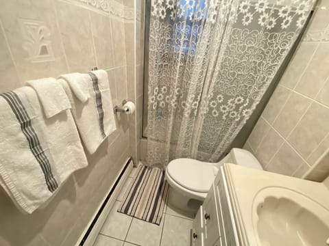 Room, 2 Bedrooms, Smoking, Patio | Bathroom | Free toiletries, towels