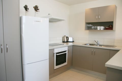 2 Bedroom Apartment (4 Adults) | Private kitchen | Full-size fridge, microwave, stovetop, dishwasher