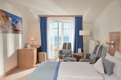 Standard Double Room, Balcony, Sea View (1st to 3rd floor) | Minibar, in-room safe, individually decorated, desk