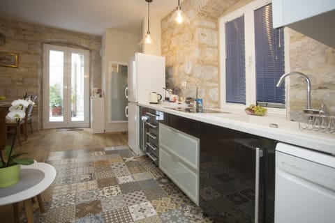 One Bedroom Apartment with Balcony | Living area | 125-cm LCD TV with cable channels, TV