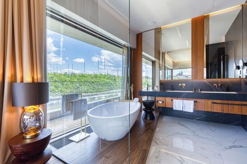 Royal Penthouse | Bathroom | Designer toiletries, hair dryer, bathrobes, slippers