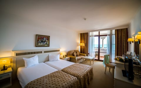 Double or Twin Room, Sea View | Minibar, in-room safe, desk, blackout drapes