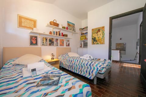 Family Townhome, Multiple Bedrooms, 2 Bathrooms, Mountainside (Residenza La Parusciola) | 3 bedrooms, iron/ironing board, free WiFi, bed sheets