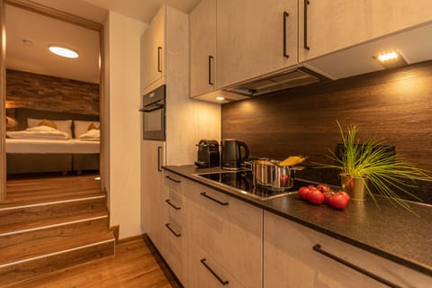 Signature Condo | Private kitchen | Fridge, microwave, oven, stovetop