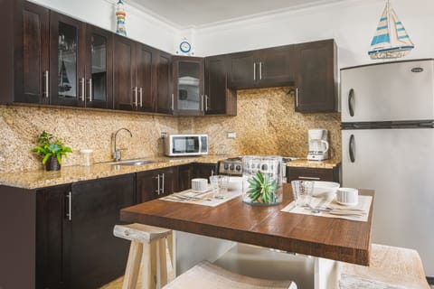 Comfort Condo | Private kitchen | Full-size fridge, microwave, oven, stovetop