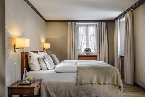 Edelweiss Deluxe Room, Mountain View | Premium bedding, down comforters, pillowtop beds, free minibar