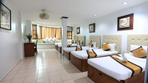 Standard Room, Multiple Beds | In-room safe, free WiFi, bed sheets