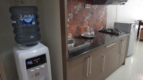 2 Bedrooms Suite | Private kitchen | Fridge, coffee/tea maker