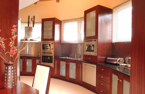 Villa | Private kitchen | Fridge, microwave, oven, stovetop